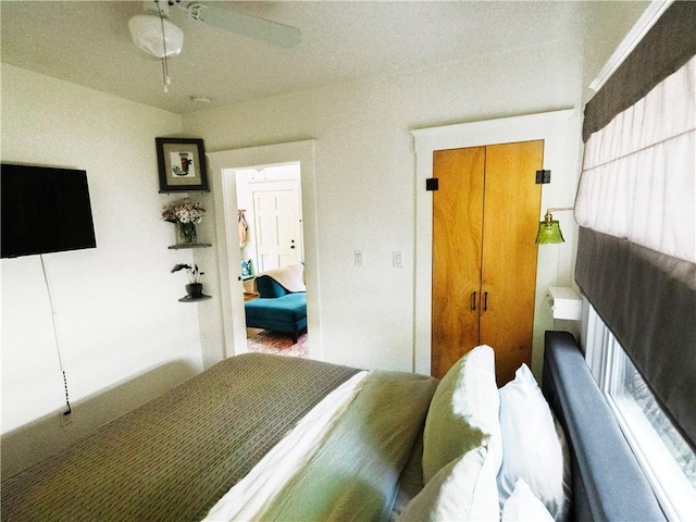 bedroom featuring ceiling fan