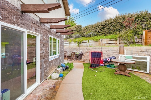 view of yard featuring fence