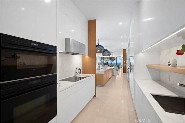 2914 Ocean Blvd, Corona Del Mar, CA 92625 - kitchen featuring white cabinets, black appliances, modern cabinets, and wall chimney exhaust hood