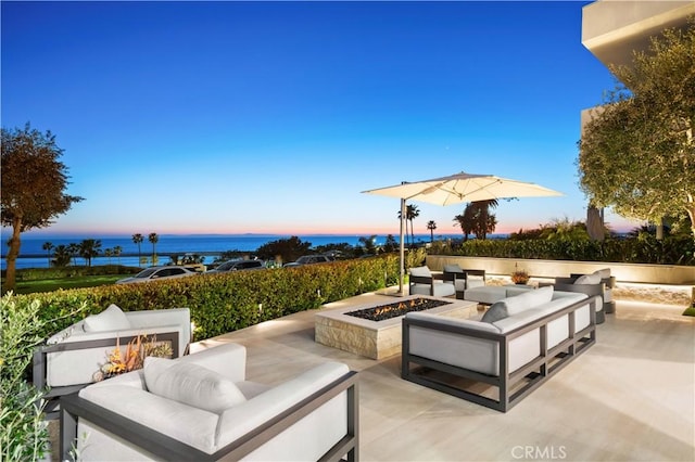 2914 Ocean Blvd, Corona Del Mar, CA 92625 - view of patio featuring an outdoor living space with a fire pit