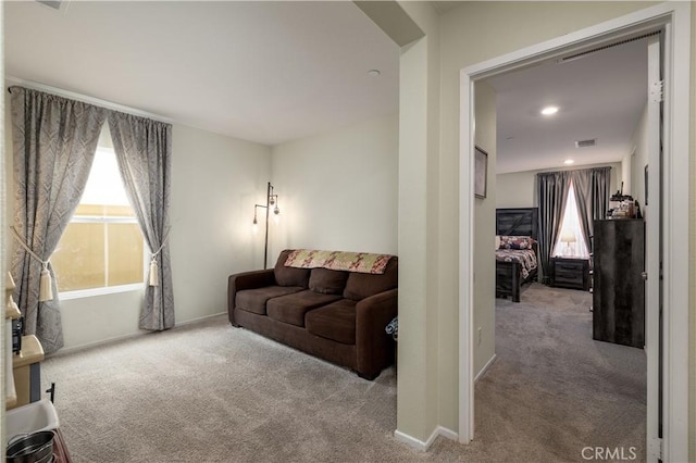 29068 Aubrey Cir, Winchester, CA 92596 - carpeted living area with baseboards, visible vents, and recessed lighting