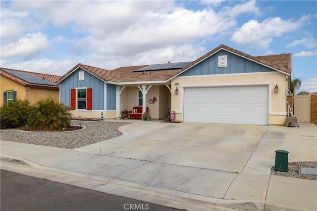 29068 Aubrey Cir, Winchester, CA 92596 - single story home featuring stucco siding, an attached garage, board and batten siding, driveway, and solar panels