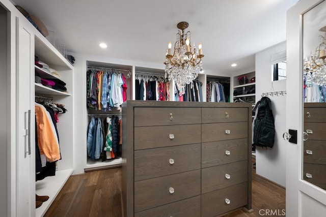 604 Begonia Ave, Corona Del Mar, CA 92625 - spacious closet with an inviting chandelier and dark wood-type flooring