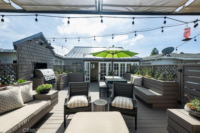 604 Begonia Ave, Corona Del Mar, CA 92625 - deck with outdoor dining area, an outdoor hangout area, and a grill