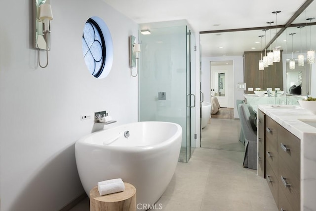 604 Begonia Ave, Corona Del Mar, CA 92625 - bathroom featuring double vanity, a shower stall, and a soaking tub