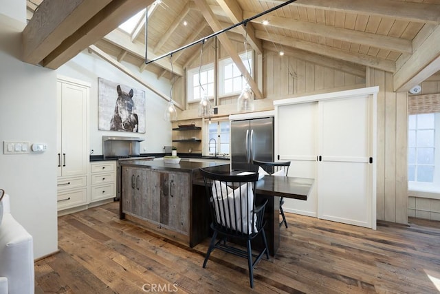 604 Begonia Ave, Corona Del Mar, CA 92625 - kitchen with a kitchen island, dark countertops, wooden ceiling, dark wood-style floors, and stainless steel appliances