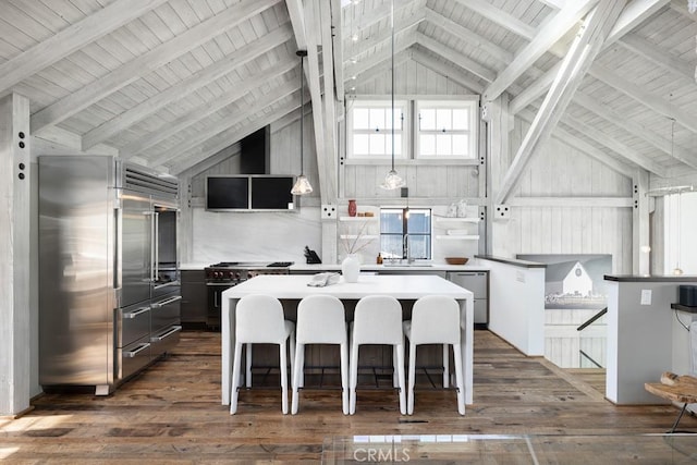 604 Begonia Ave, Corona Del Mar, CA 92625 - kitchen with lofted ceiling with beams, a sink, dark wood finished floors, high end appliances, and range hood