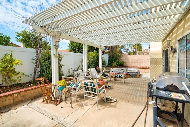 view of patio with outdoor dining space and a fenced backyard