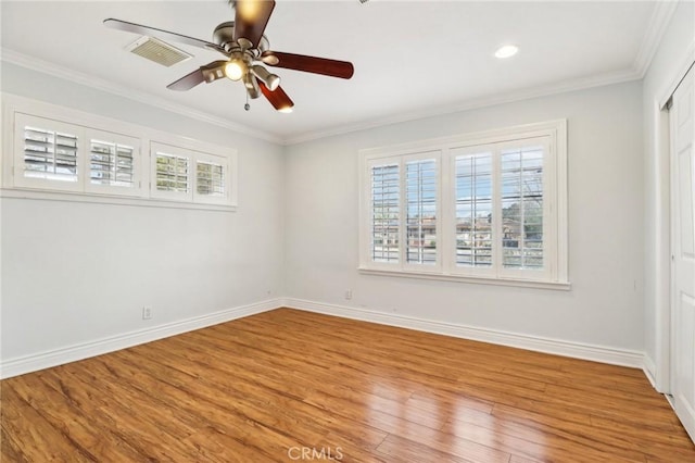 1202 W Lancaster Blvd, Lancaster, CA 93534 - spare room featuring ceiling fan, wood finished floors, baseboards, ornamental molding, and recessed lighting