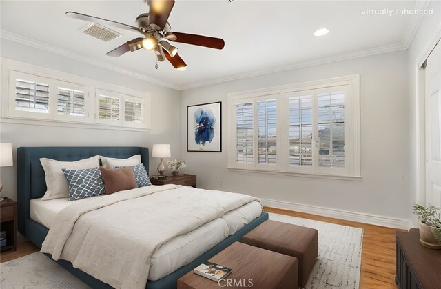 1202 W Lancaster Blvd, Lancaster, CA 93534 - bedroom featuring light wood-style flooring, multiple windows, ornamental molding, a ceiling fan, and recessed lighting