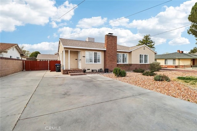 1202 W Lancaster Blvd, Lancaster, CA 93534 - view of front facade featuring stucco siding and a chimney