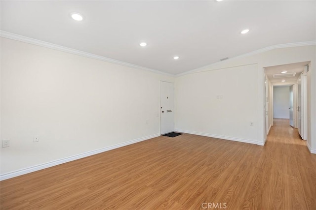 647 Avenida Sevilla Unit A, Laguna Woods, CA 92637 - unfurnished room featuring crown molding, baseboards, recessed lighting, and light wood-style floors