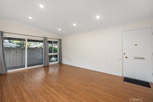 647 Avenida Sevilla Unit A, Laguna Woods, CA 92637 - spare room featuring recessed lighting, baseboards, crown molding, and wood finished floors