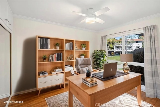 647 Avenida Sevilla Unit A, Laguna Woods, CA 92637 - office space featuring ornamental molding, ceiling fan, wood finished floors, and baseboards