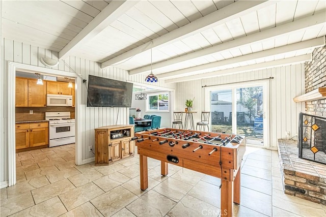 1307 N Allyn Ave, Ontario, CA 91764 - recreation room featuring beam ceiling, a fireplace, and wood walls