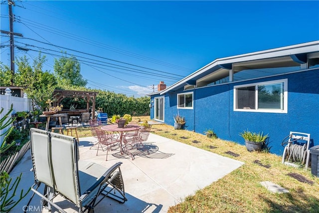 1307 N Allyn Ave, Ontario, CA 91764 - view of patio featuring a pergola and outdoor dining area