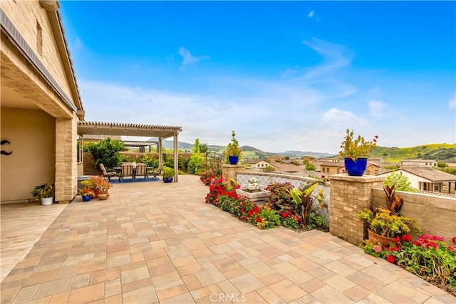 35 Cantar St, Rancho Mission Viejo, CA 92694 - view of patio / terrace with a pergola, fence, a mountain view, and outdoor dining area