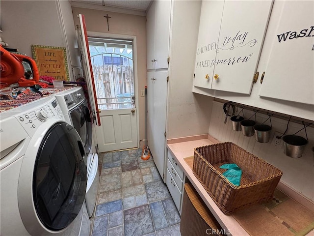433 Oakmont Dr, Barstow, CA 92311 - clothes washing area with cabinet space, stone finish floor, and washing machine and clothes dryer