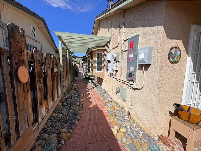 433 Oakmont Dr, Barstow, CA 92311 - view of side of property featuring stucco siding and fence