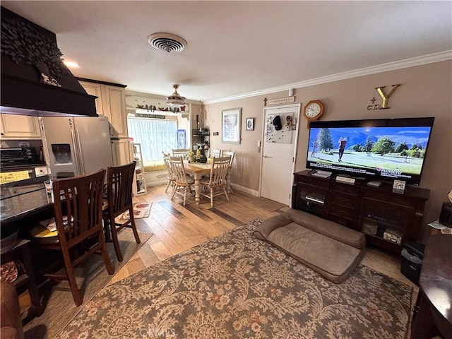 433 Oakmont Dr, Barstow, CA 92311 - interior space with crown molding, light wood-style floors, visible vents, and baseboards