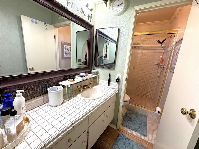433 Oakmont Dr, Barstow, CA 92311 - full bathroom with a shower stall, toilet, vanity, and a textured wall