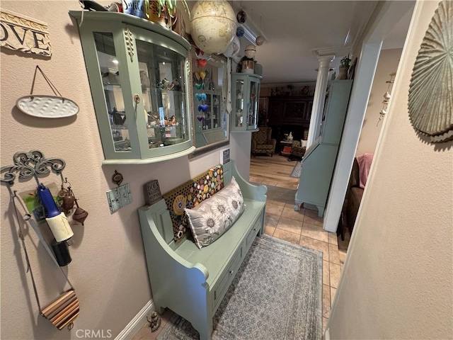 433 Oakmont Dr, Barstow, CA 92311 - interior space with light tile patterned floors and decorative columns