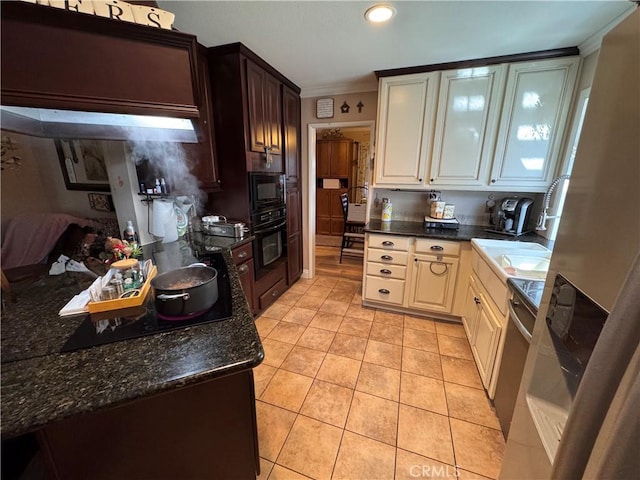 433 Oakmont Dr, Barstow, CA 92311 - kitchen with black appliances, dark stone counters, light tile patterned floors, and ornamental molding