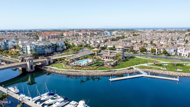bird's eye view featuring a residential view and a water view