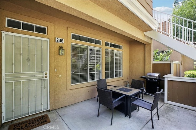 view of patio / terrace featuring grilling area and outdoor dining space