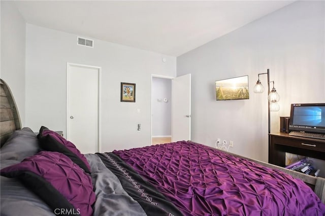 bedroom featuring visible vents