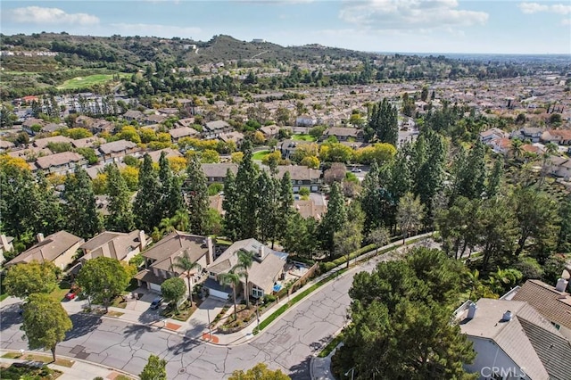 birds eye view of property with a residential view