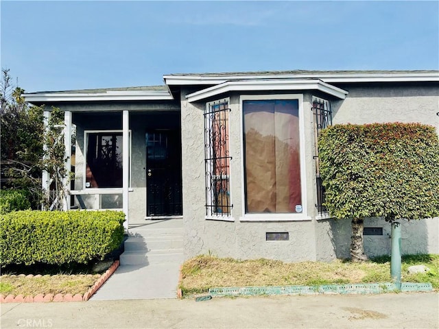 155 E Century Blvd, Los Angeles, CA 90003 - view of front of property with covered porch and stucco siding