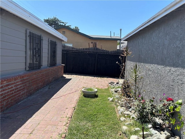155 E Century Blvd, Los Angeles, CA 90003 - view of yard with fence and a patio area