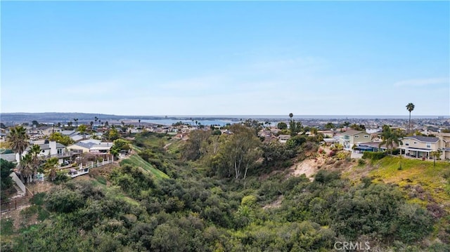 birds eye view of property with a residential view