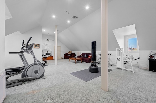 workout room with carpet flooring, visible vents, and lofted ceiling