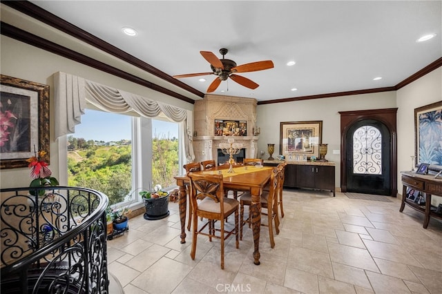 dining room with ornamental molding, recessed lighting, and a ceiling fan