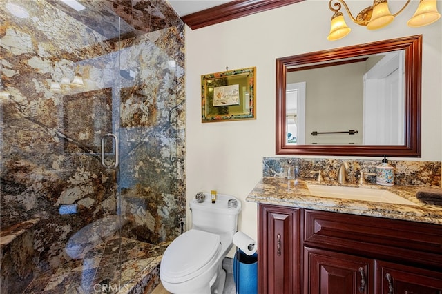 bathroom featuring ornamental molding, a marble finish shower, toilet, and vanity