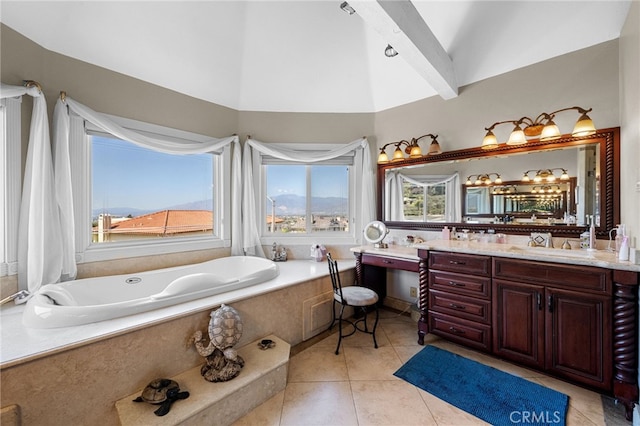 bathroom featuring high vaulted ceiling, a garden tub, tile patterned flooring, and vanity
