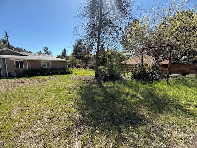 view of yard featuring fence