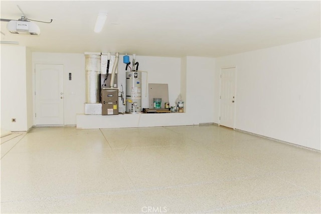 garage with a garage door opener, secured water heater, and baseboards
