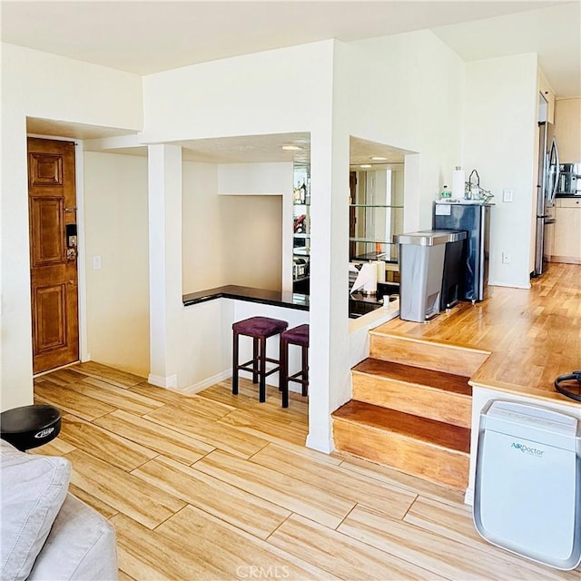 living area featuring wood finished floors