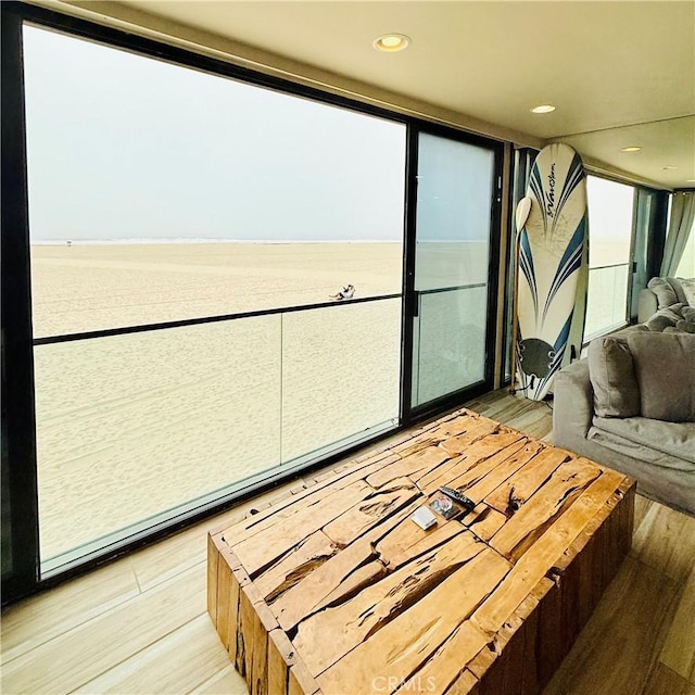 bedroom with recessed lighting and light wood-type flooring