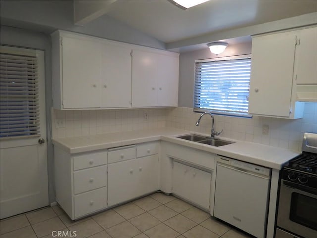 kitchen with white cabinetry, gas stove, white dishwasher, and a sink