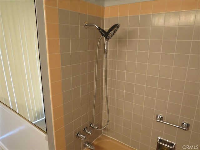 bathroom featuring washtub / shower combination