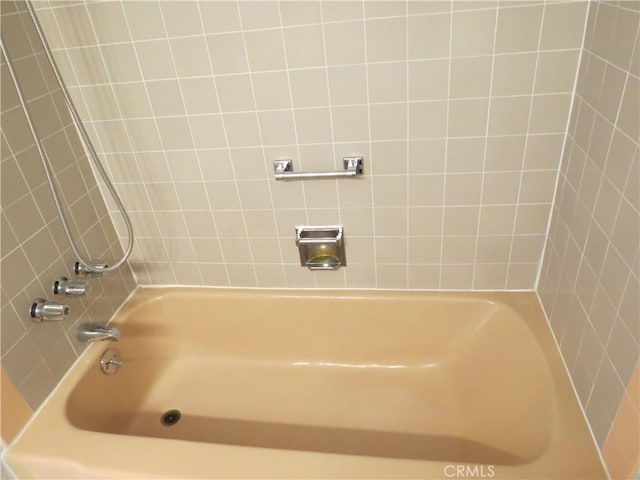 full bath featuring  shower combination