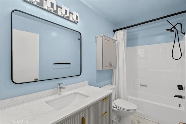 bathroom featuring marble finish floor, shower / tub combo, toilet, and vanity
