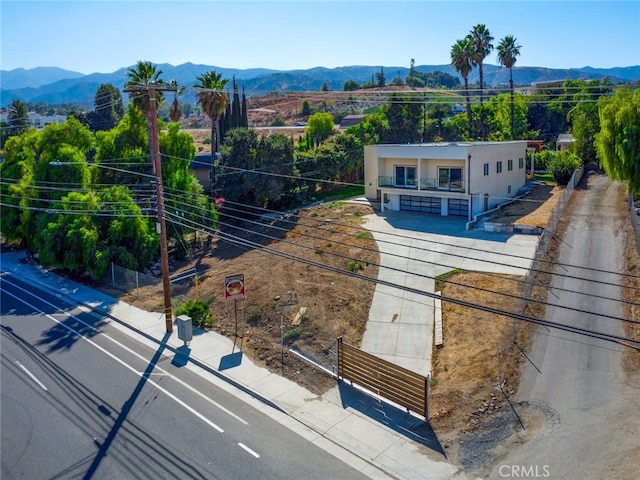 21655 Temescal Canyon Rd, Corona, CA 92883 - drone / aerial view featuring a mountain view