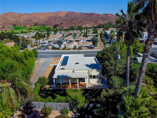 21655 Temescal Canyon Rd, Corona, CA 92883 - drone / aerial view featuring a mountain view and a residential view