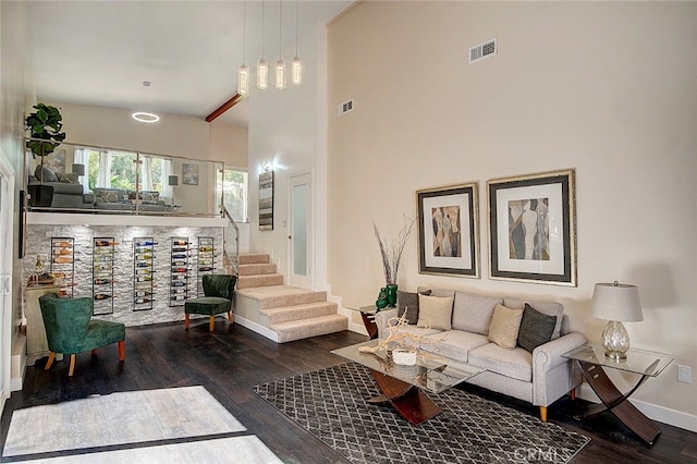 21655 Temescal Canyon Rd, Corona, CA 92883 - living room with stairway, wood finished floors, visible vents, and baseboards