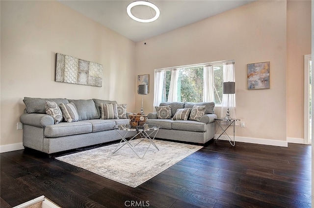 21655 Temescal Canyon Rd, Corona, CA 92883 - living room with baseboards and dark wood finished floors